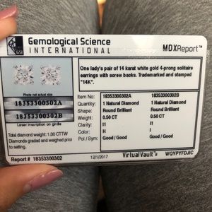 White gold solitaire earrings